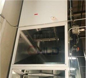 Cabina de polvorització amb cremador de foc directe